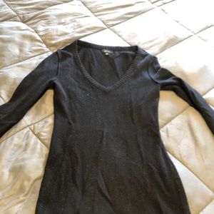 Guess. Black sweater.